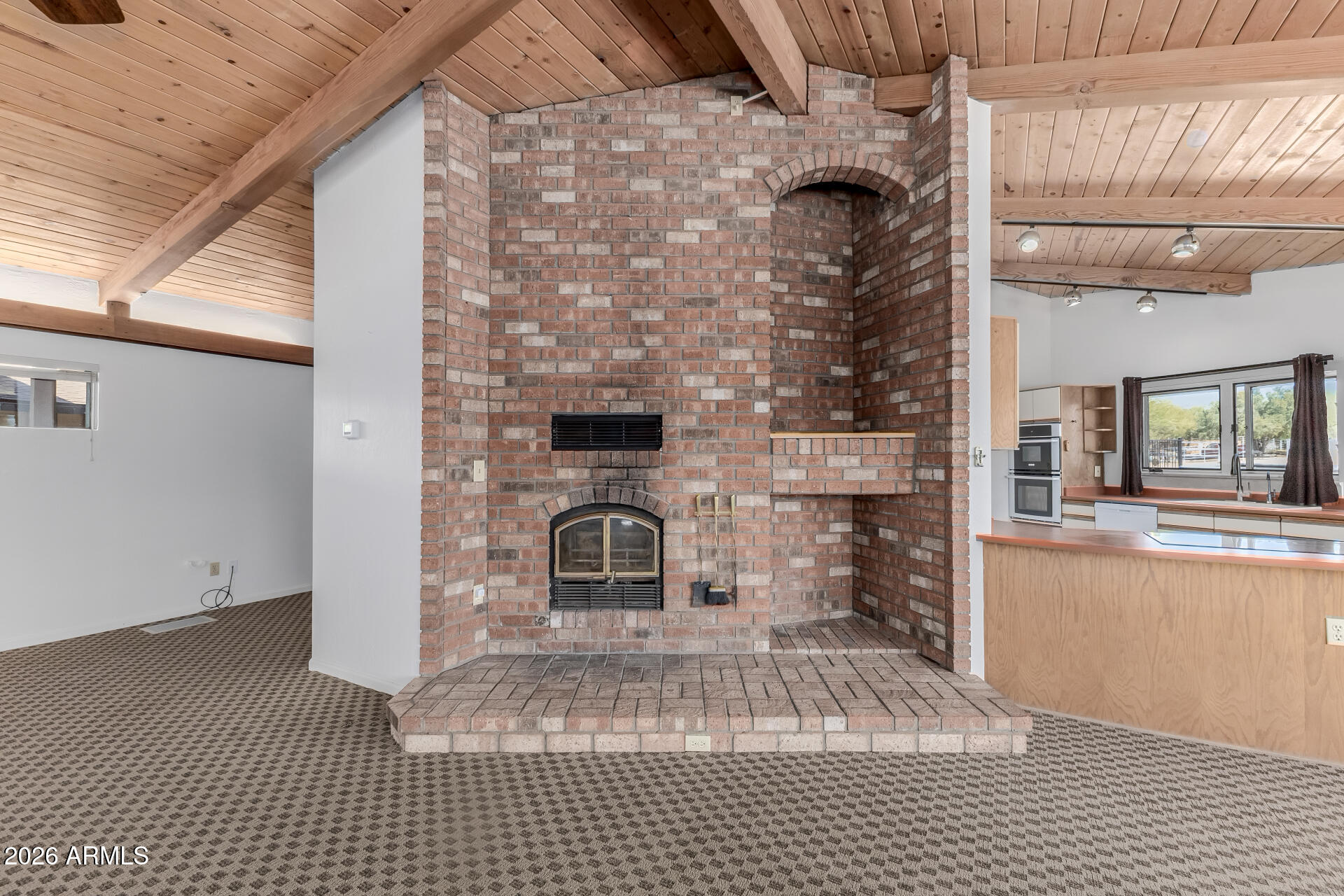 6140 East Peak View Road Cave Creek, AZ 85331 - Photo 11 of 52 a view of a fireplace with a sink