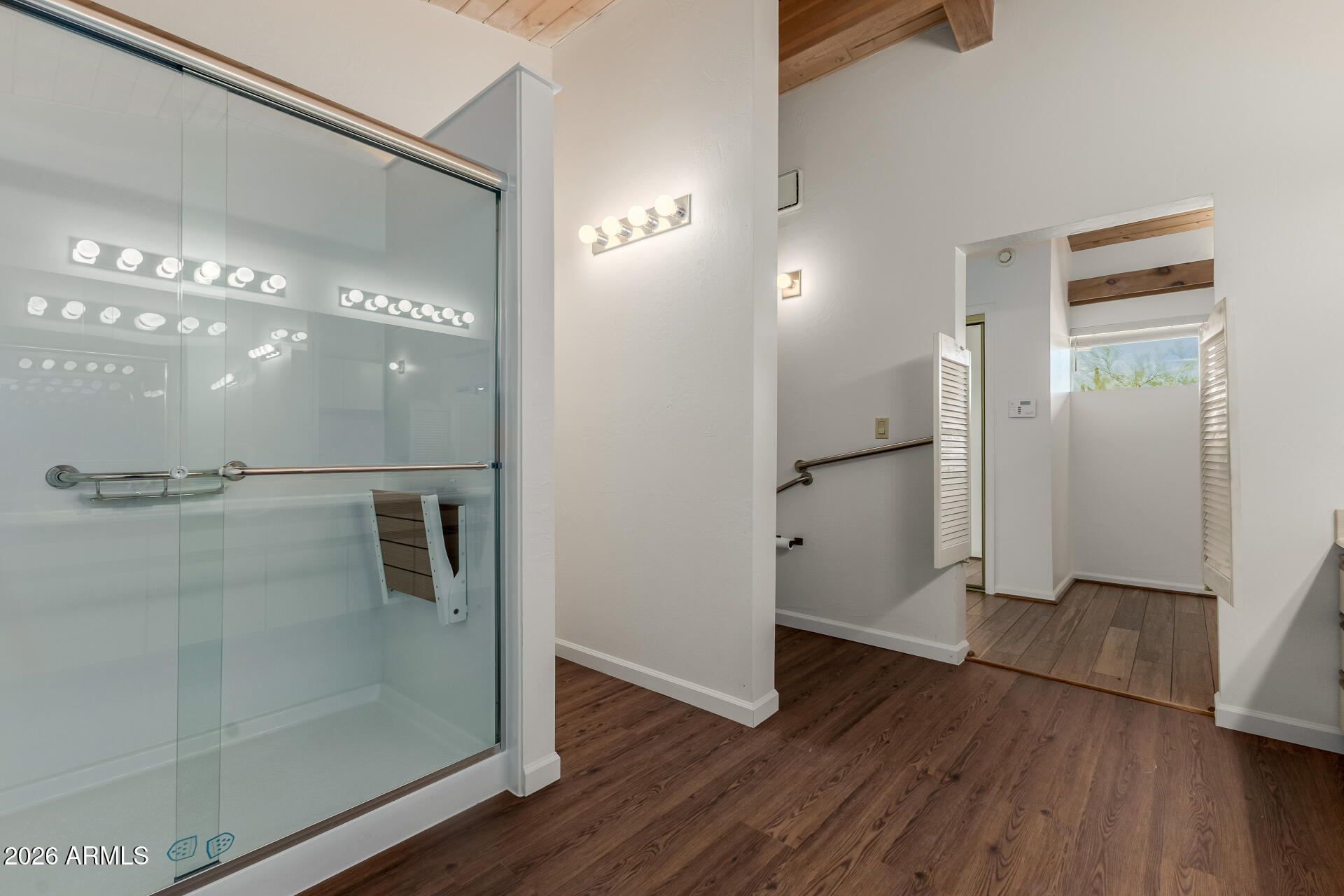 6140 East Peak View Road Cave Creek, AZ 85331 - Photo 15 of 52 a view of a hallway with wooden floor