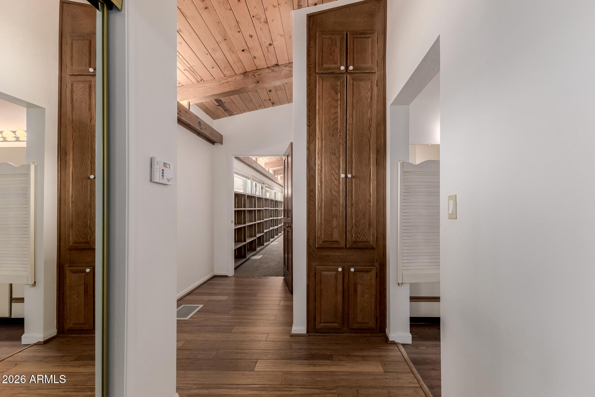 6140 East Peak View Road Cave Creek, AZ 85331 - Photo 17 of 52 a view of hallway with wooden floor