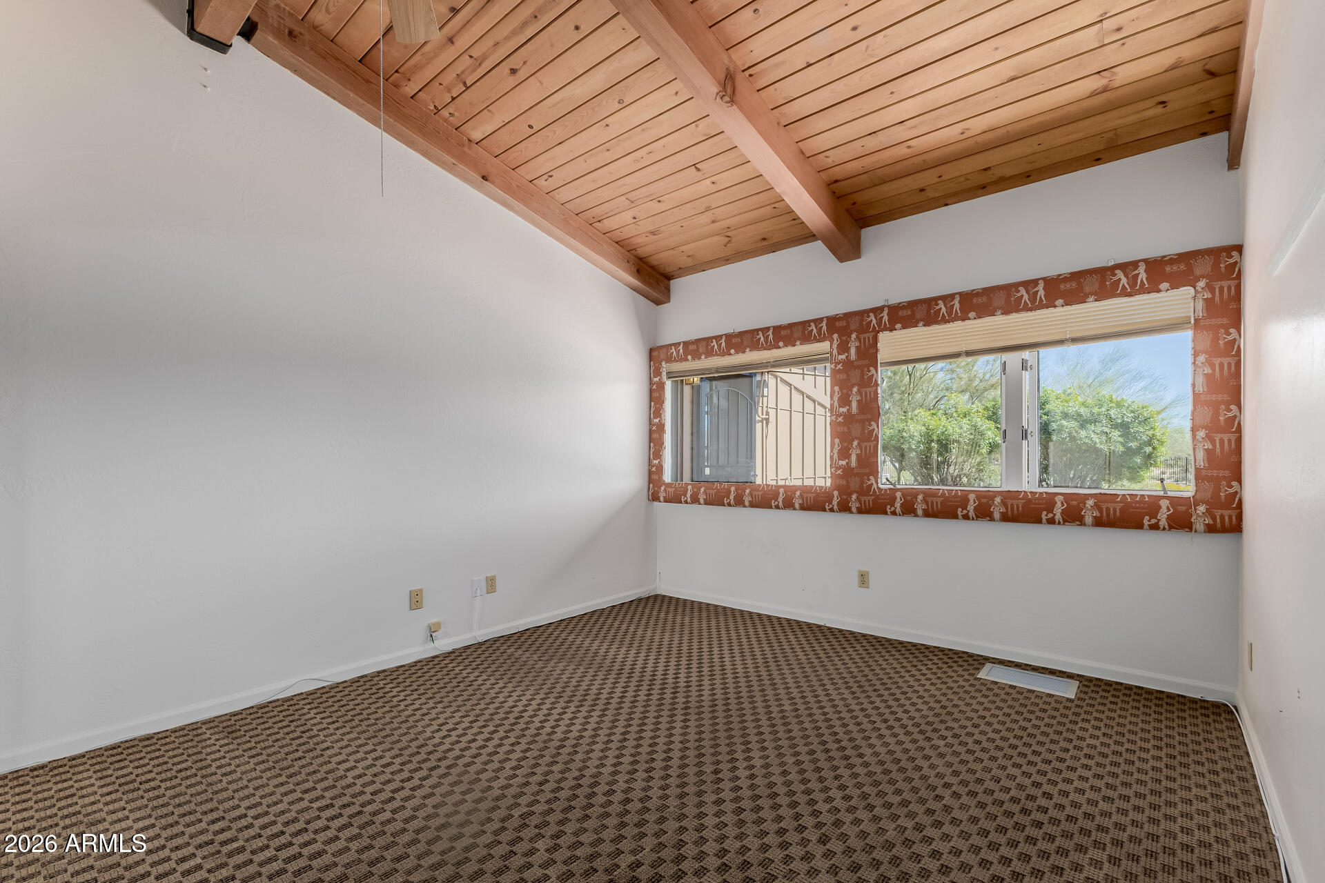 6140 East Peak View Road Cave Creek, AZ 85331 - Photo 18 of 52 a view of an empty room with a window