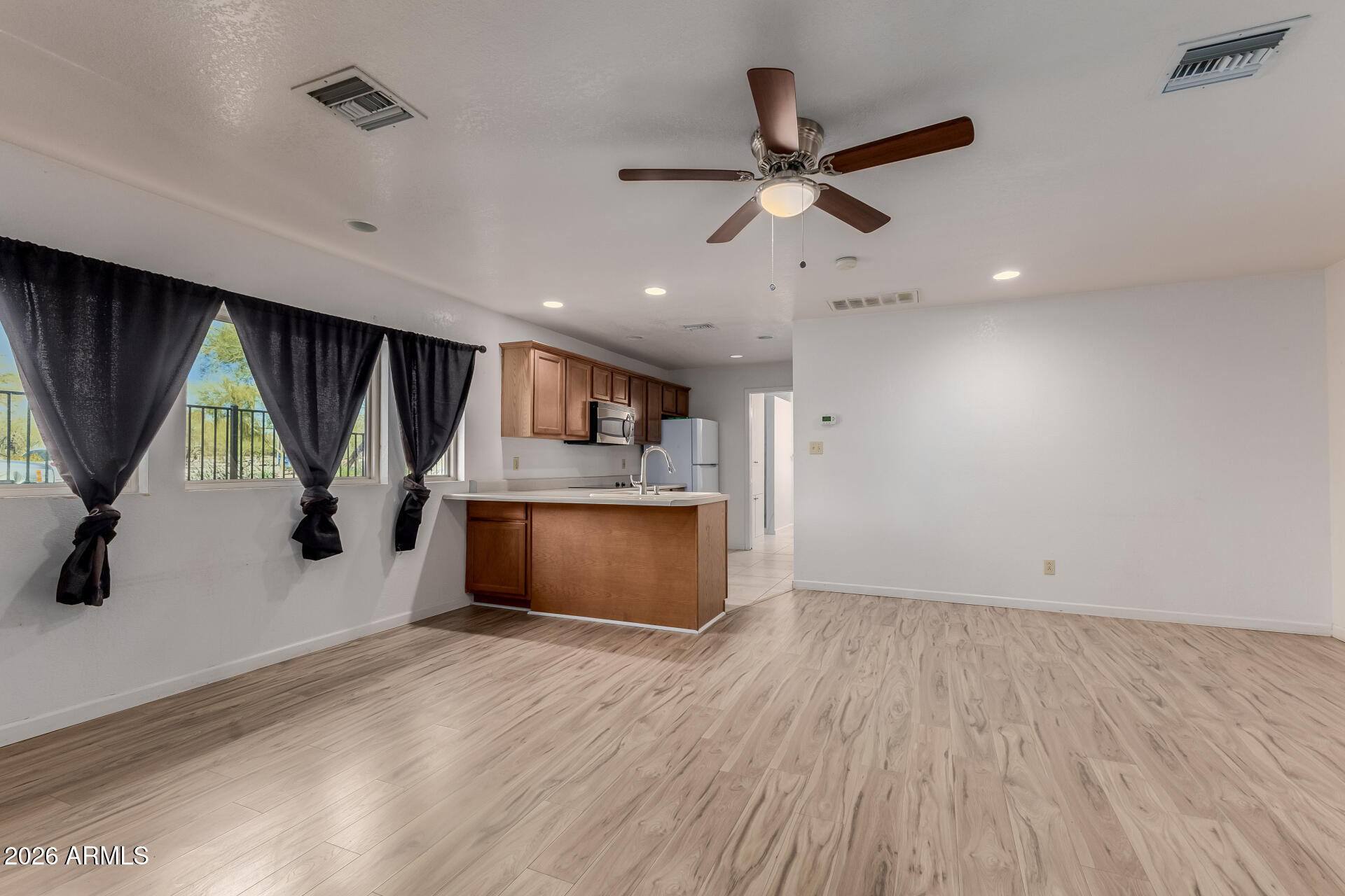 6140 East Peak View Road Cave Creek, AZ 85331 - Photo 26 of 52 a view of workspace with wooden floor and windows