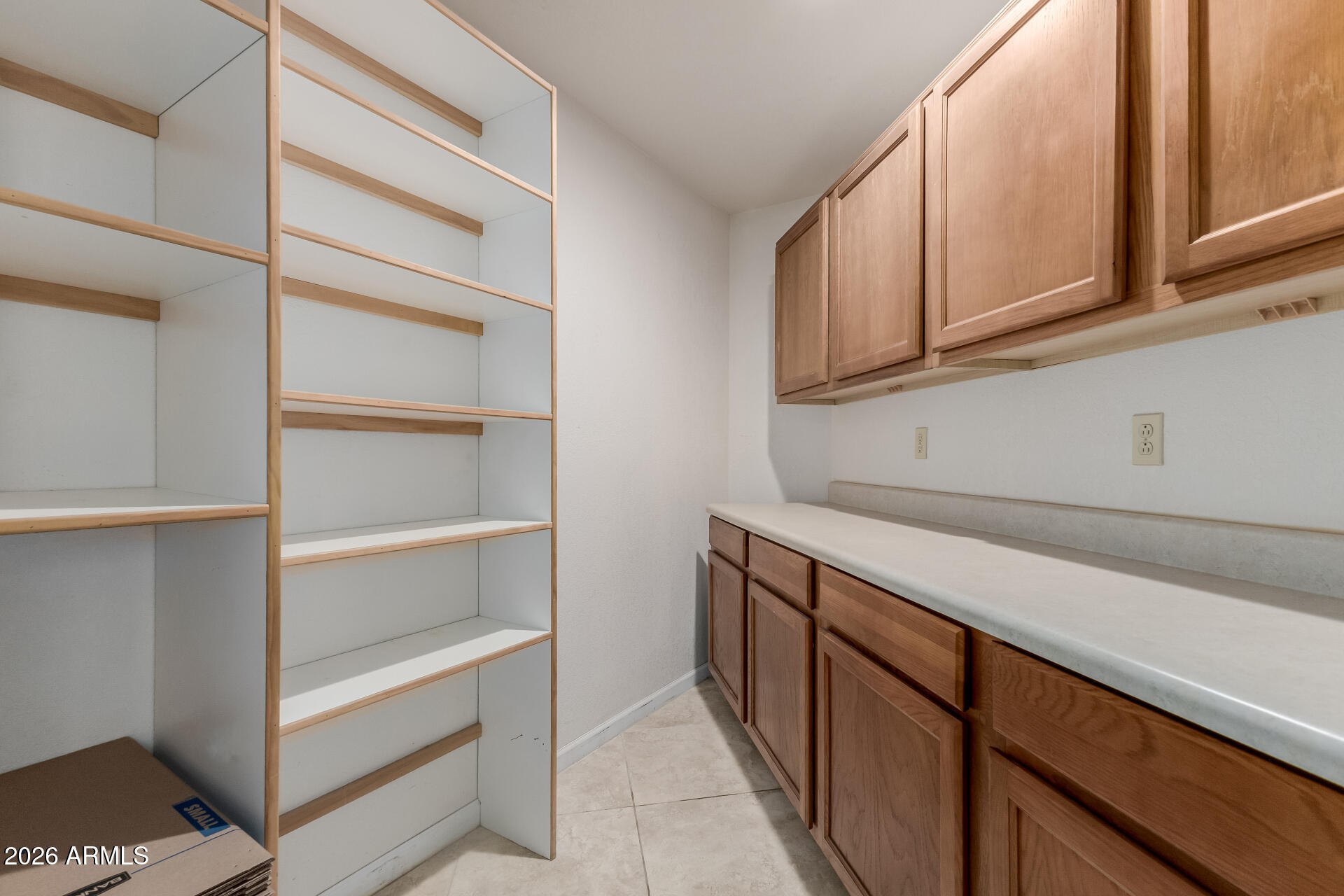 6140 East Peak View Road Cave Creek, AZ 85331 - Photo 36 of 52 a kitchen with cabinets and a window