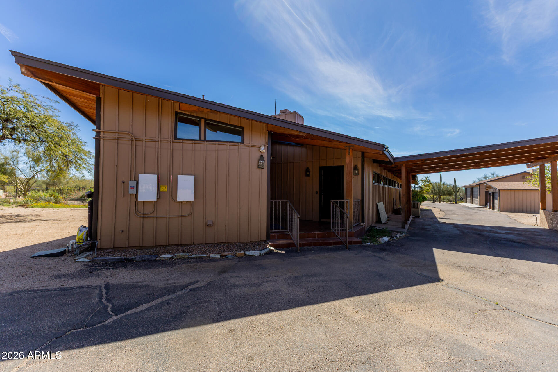 6140 East Peak View Road Cave Creek, AZ 85331 - Photo 40 of 52 a house view with a backyard space
