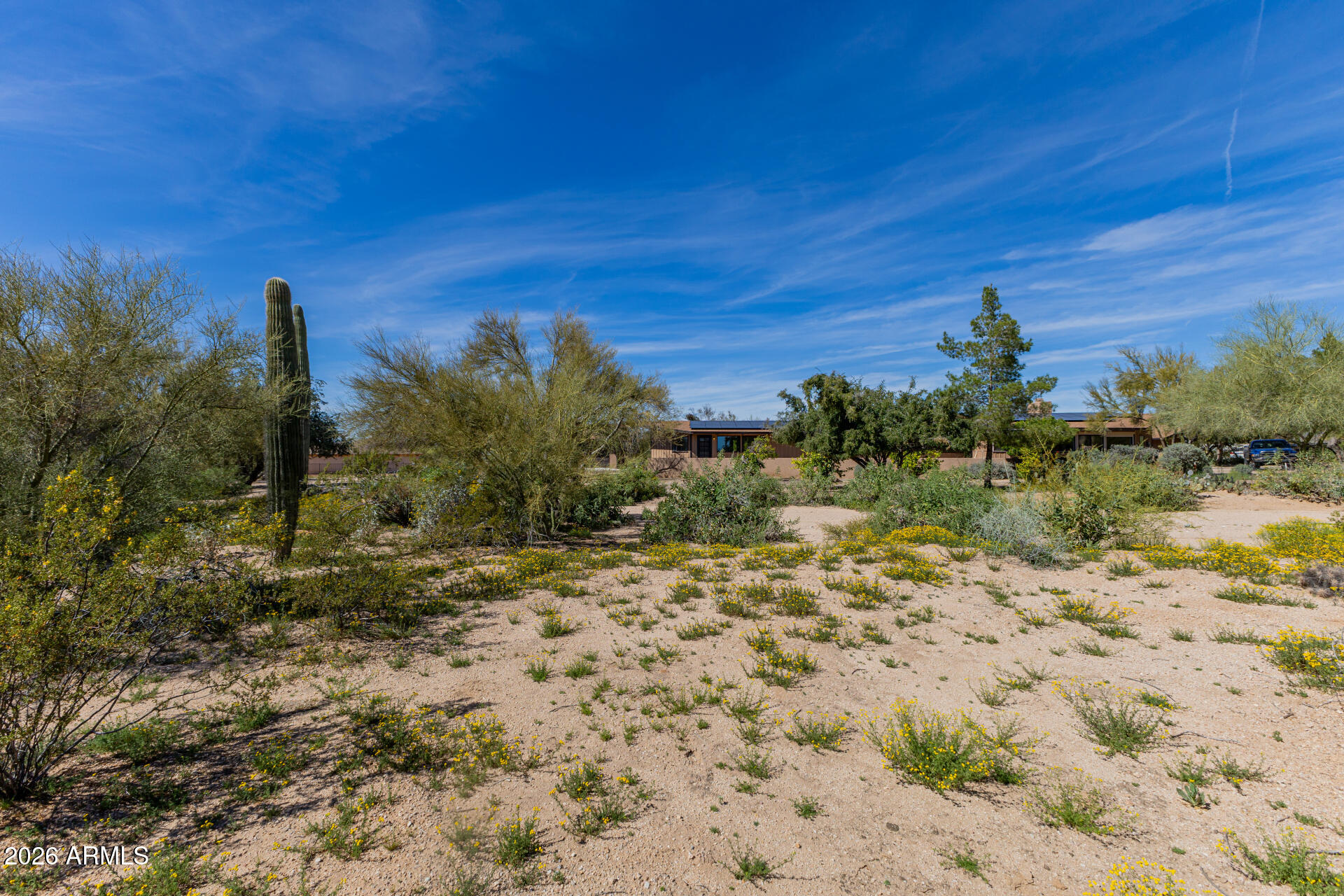 6140 East Peak View Road Cave Creek, AZ 85331 - Photo 46 of 52 a view of a yard with a house