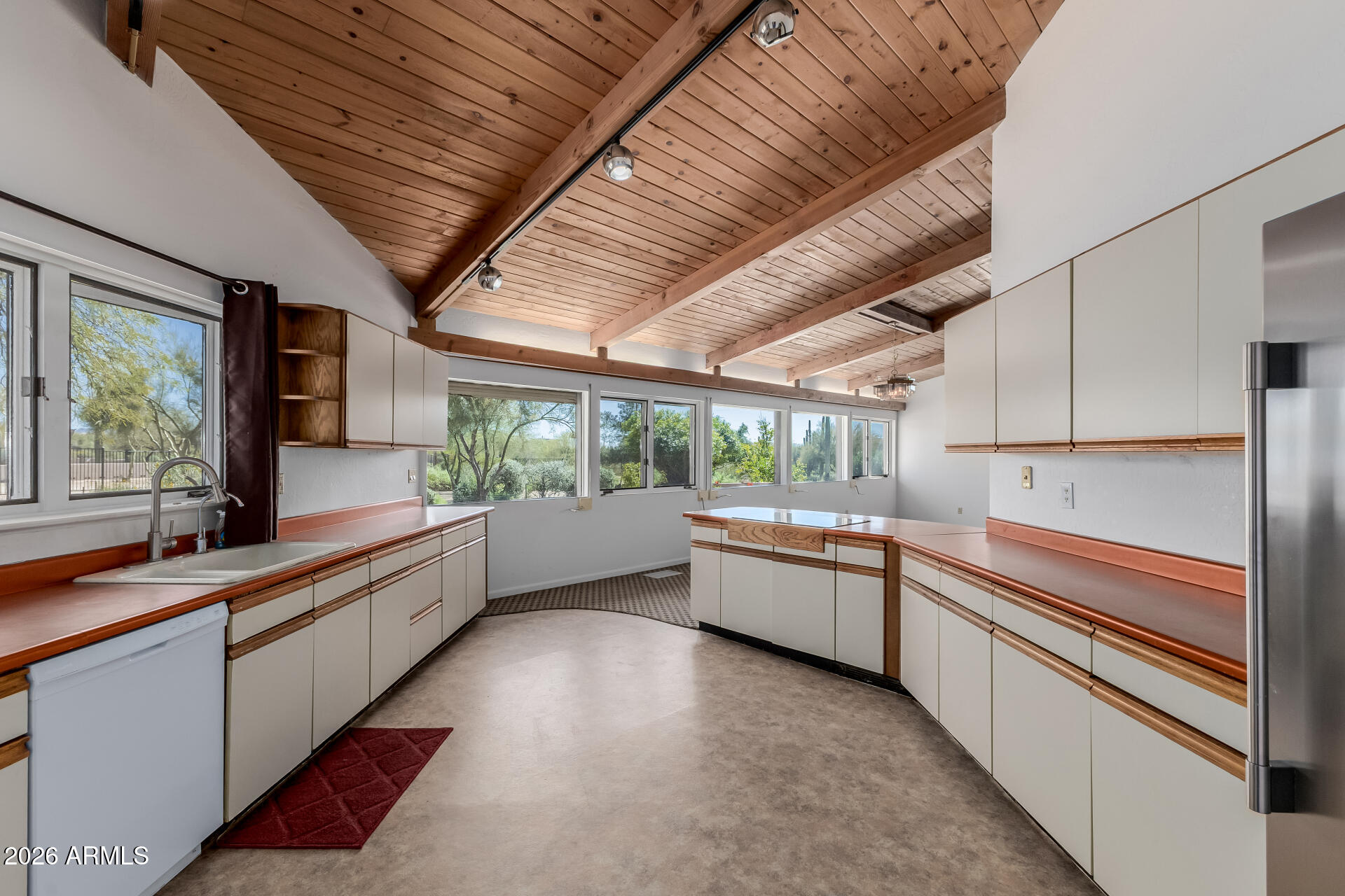 6140 East Peak View Road Cave Creek, AZ 85331 - Photo 9 of 52 a large kitchen with kitchen island granite countertop lots of counter top space