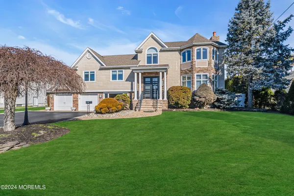 a view of a dining room with furniture and window