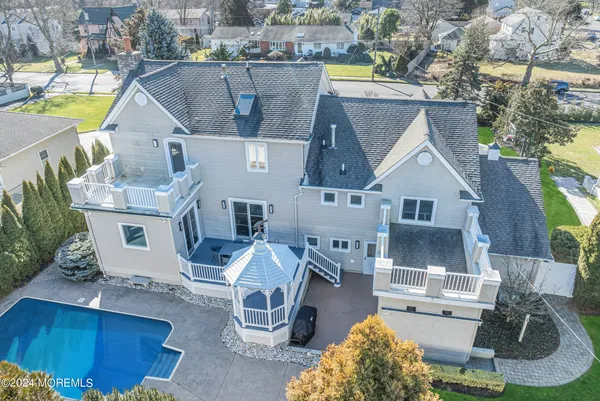 a dining room with a table and chairs