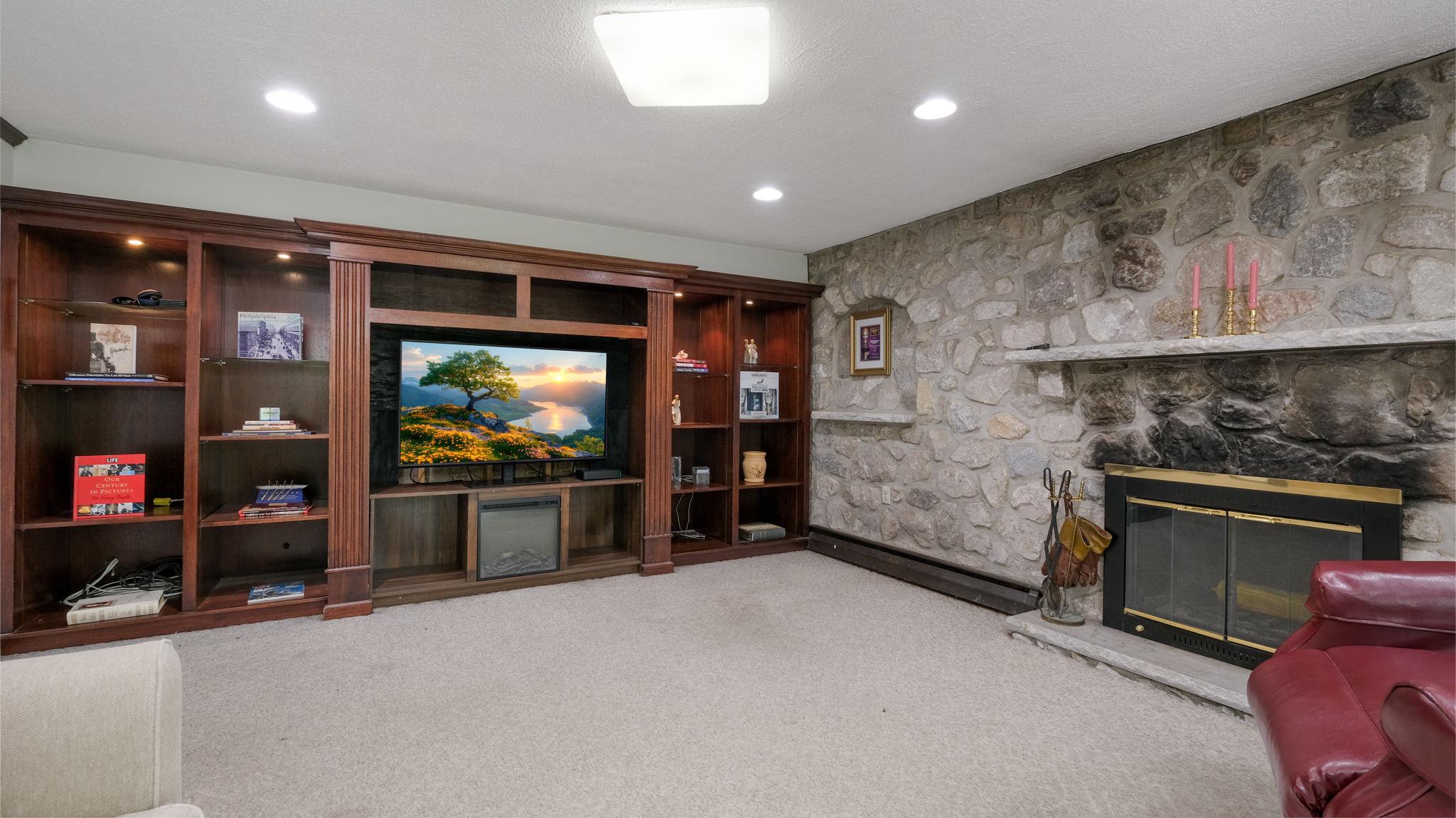 816 Warren Road Ambler, PA 19002 - Photo 25 of 51 Cozy family room with stone accents