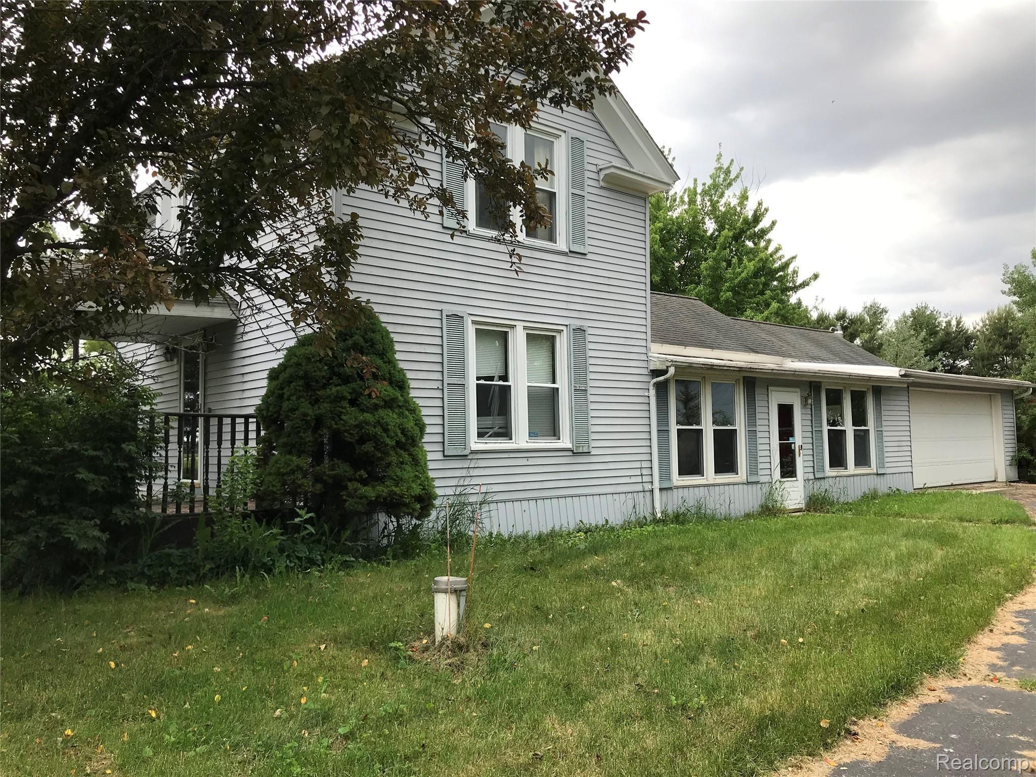 2057 North Kirk Road Fairgrove, MI 48733 - Photo 2 of 12 Front Side View of House (2057 N. Kirk Rd
