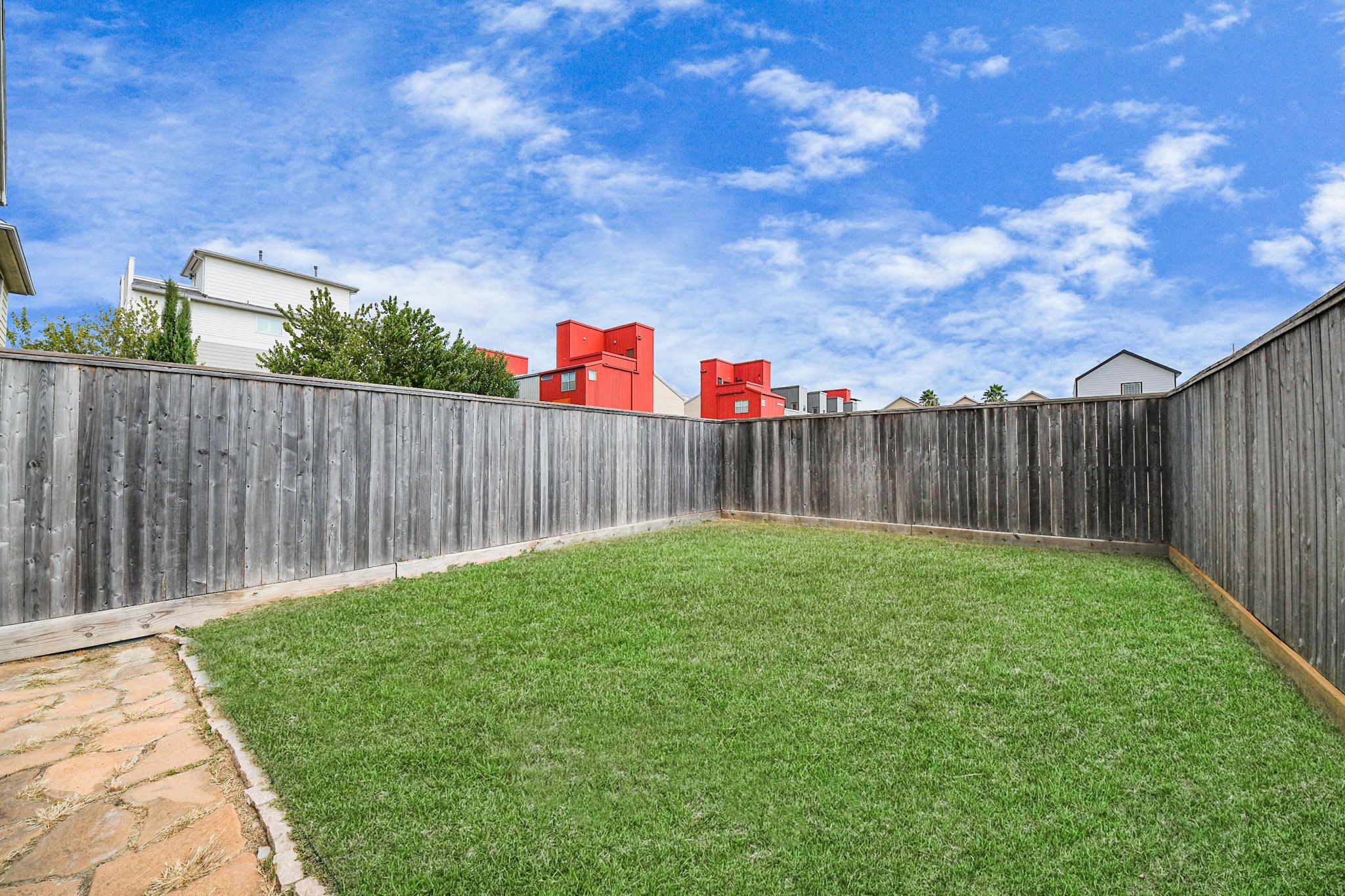 2941 Clinton Drive Houston, TX 77020 - Photo 28 of 35 a backyard of a house with lots of green space