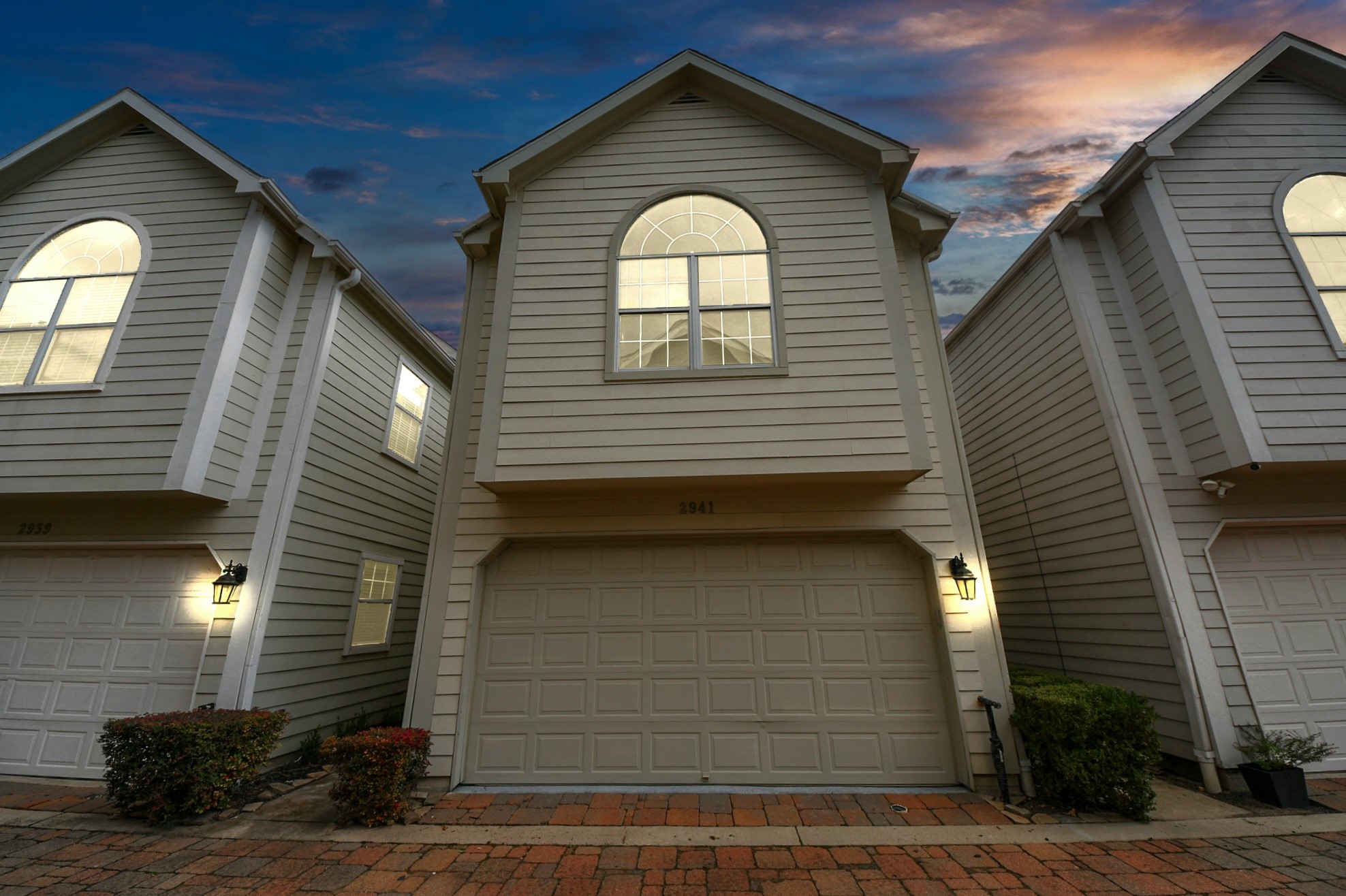 2941 Clinton Drive Houston, TX 77020 - Photo 34 of 35 a view of a house with wooden walls and potted plants