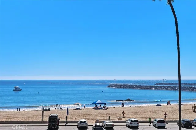 a view of an ocean with a nearby beach