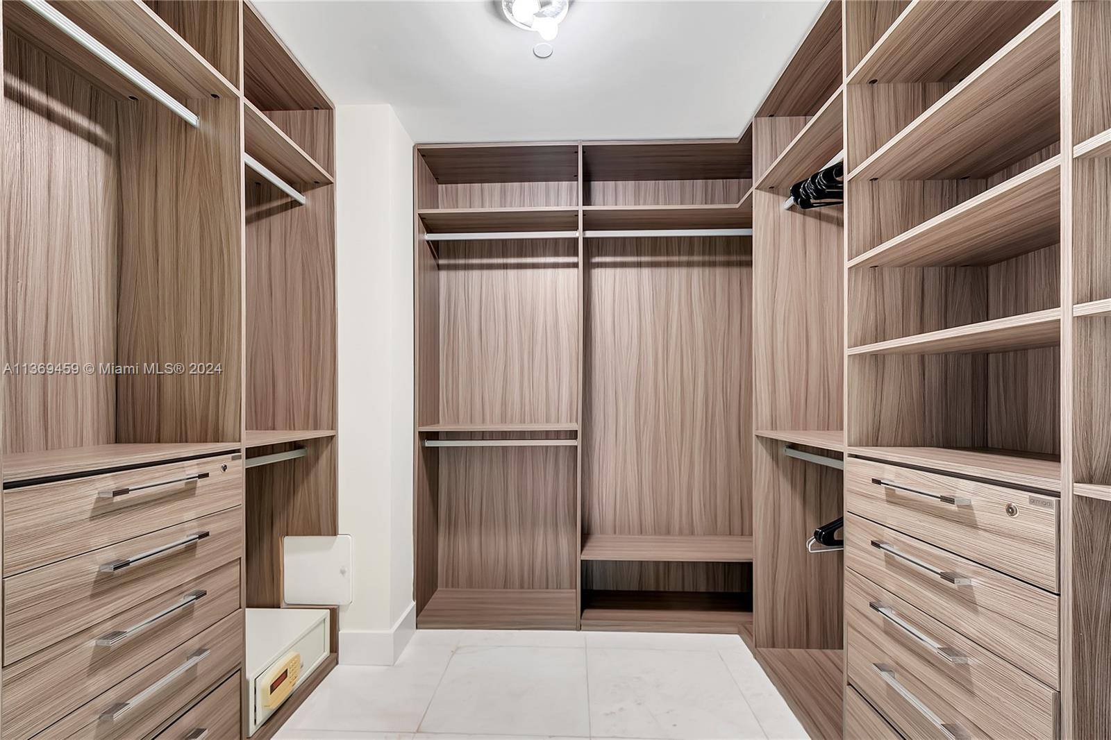 360 Ocean Drive, Unit 205S Key Biscayne, FL 33149 - Photo 14 of 27 a view of closet area