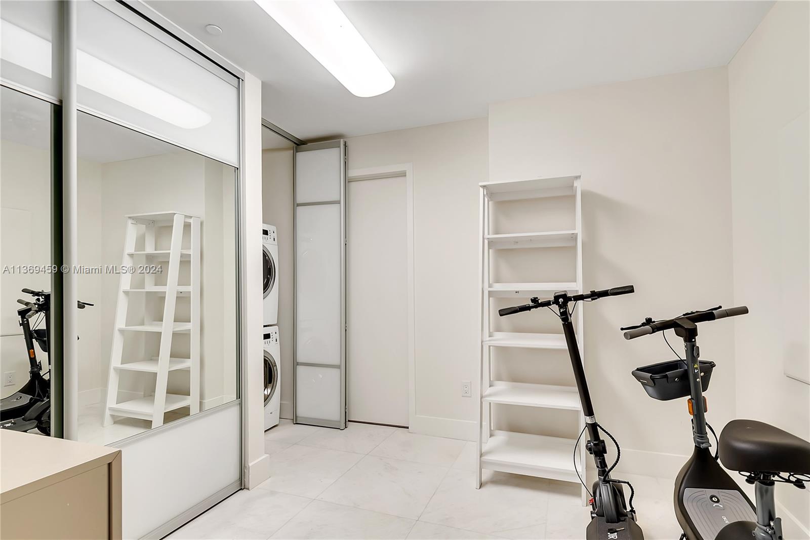 360 Ocean Drive, Unit 205S Key Biscayne, FL 33149 - Photo 18 of 27 a view of a room with gym equipment