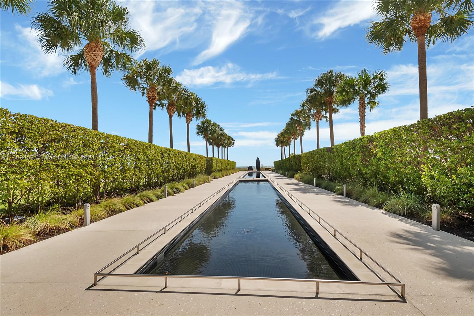 360 Ocean Drive, Unit 205S Key Biscayne, FL 33149 - Photo 27 of 27 a view of a yard with palm tree