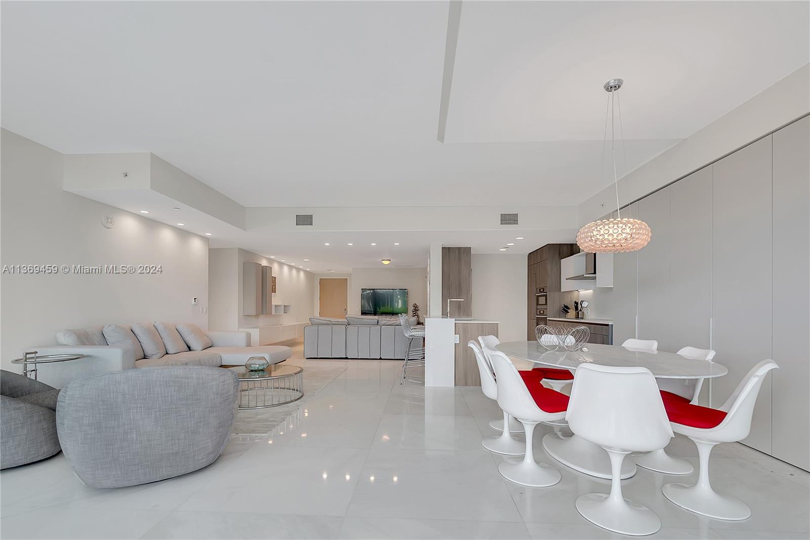 360 Ocean Drive, Unit 205S Key Biscayne, FL 33149 - Photo 4 of 27 a room with a couch and chairs