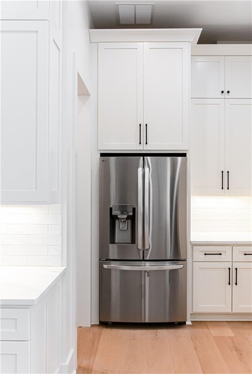3286 Elwin Ragsdale Way Acworth, GA 30102 - Photo 16 of 51 a kitchen with metallic refrigerator freezer and a dishwasher
