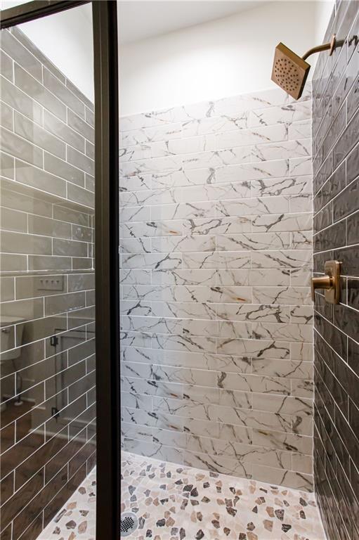 3286 Elwin Ragsdale Way Acworth, GA 30102 - Photo 22 of 51 a bathroom with a shower and a sink