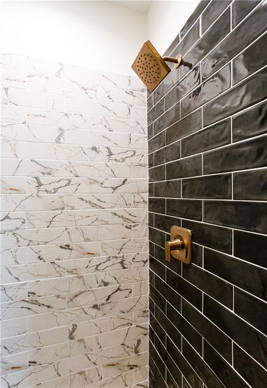 3286 Elwin Ragsdale Way Acworth, GA 30102 - Photo 23 of 51 a bathroom with a shower