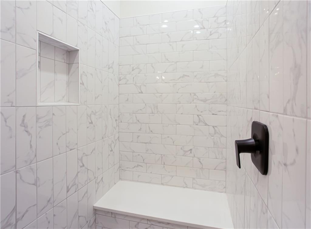 3286 Elwin Ragsdale Way Acworth, GA 30102 - Photo 26 of 51 a bathroom with a shower