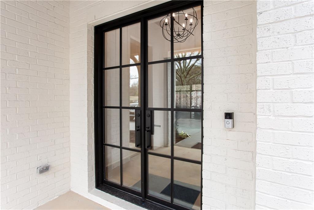3286 Elwin Ragsdale Way Acworth, GA 30102 - Photo 8 of 51 a bathroom with a glass door