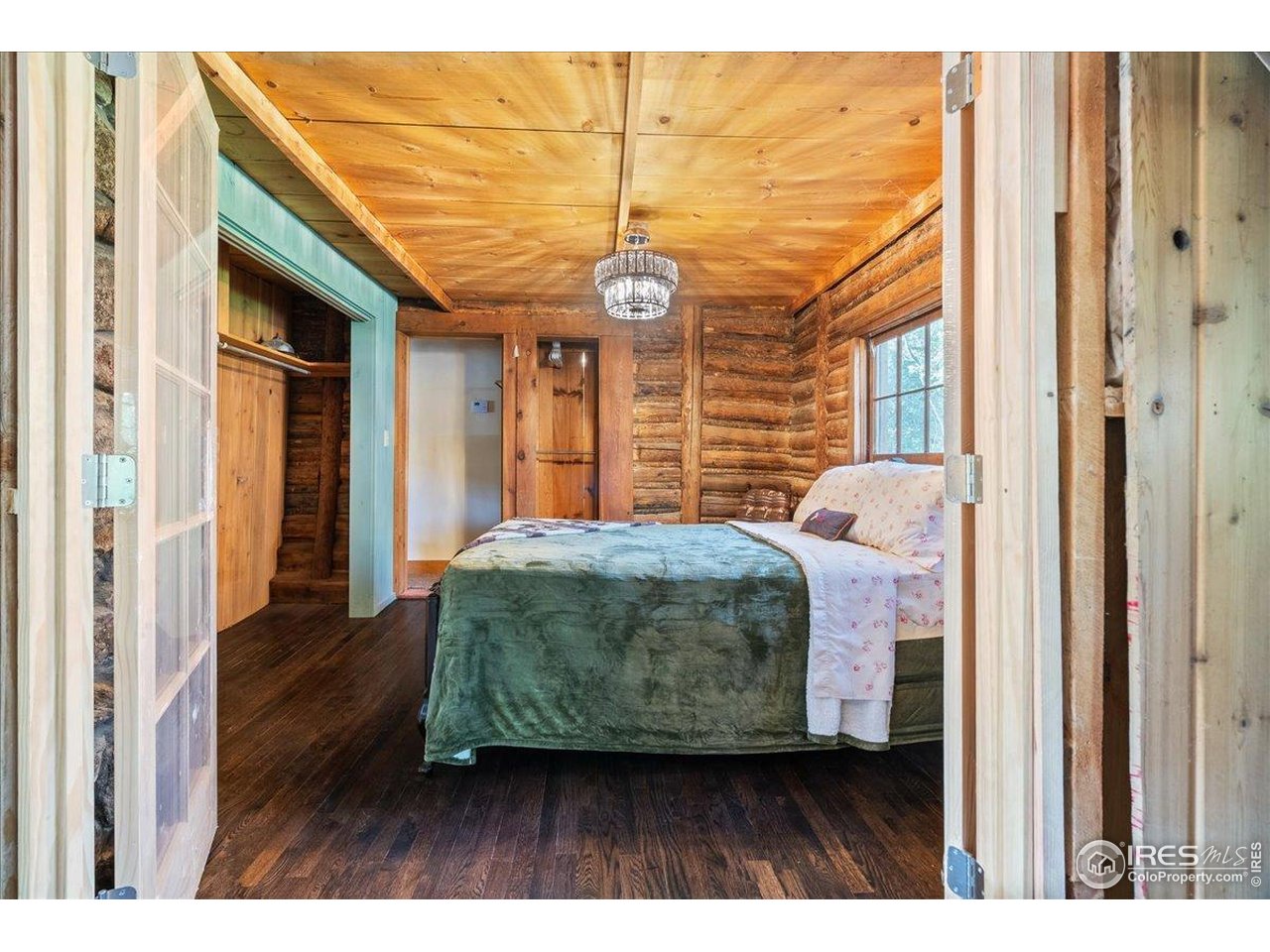 49 Riverside Drive Lyons, CO 80540 - Photo 17 of 32 a workspace with wooden floor and windows