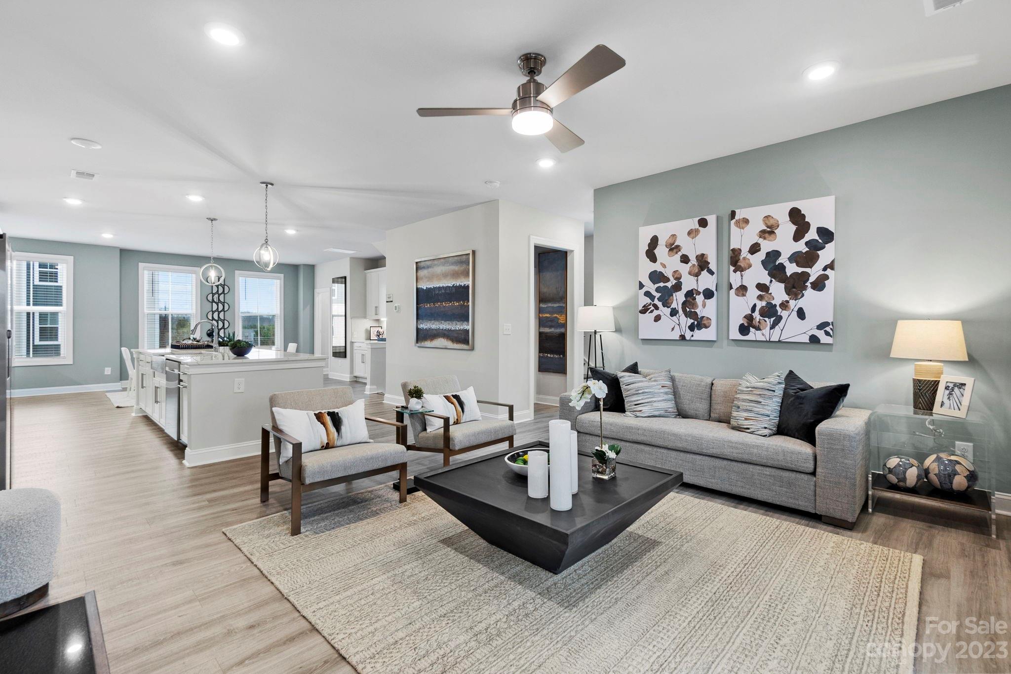 4505 Forsyth Place Fort Mill, SC 29708 - Photo 12 of 23 a living room with furniture and view of kitchen