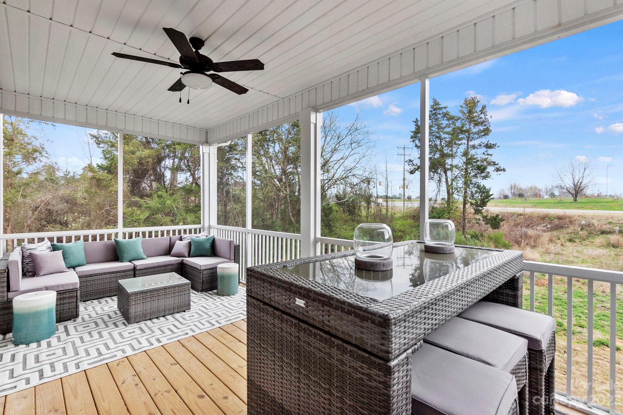 4505 Forsyth Place Fort Mill, SC 29708 - Photo 13 of 23 a living room with furniture and a large window