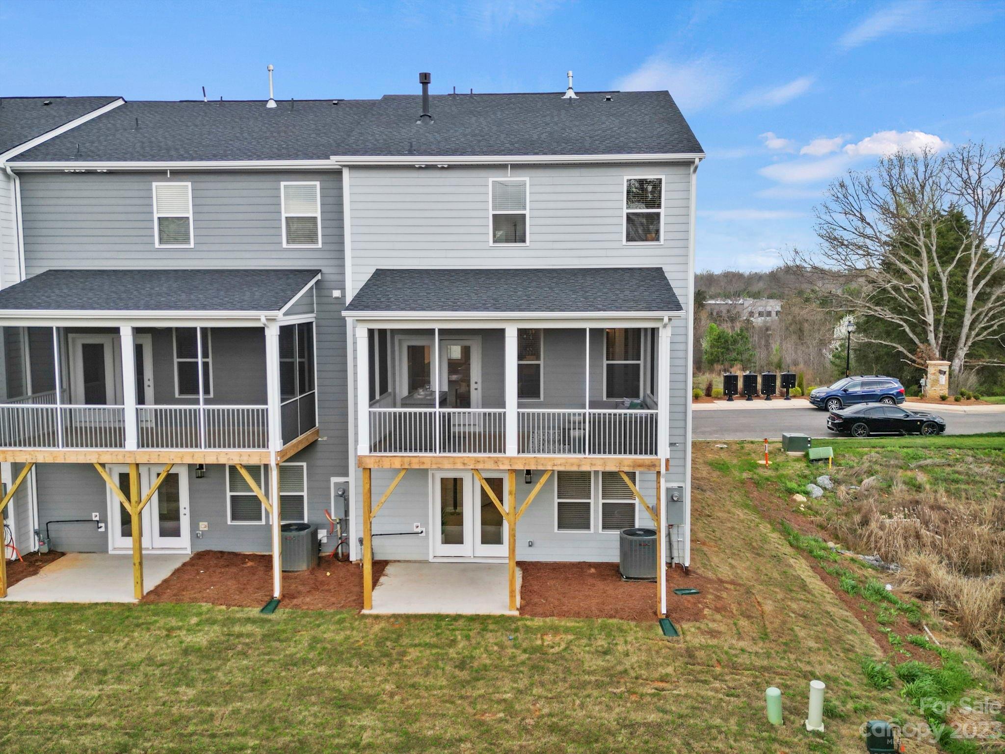 4505 Forsyth Place Fort Mill, SC 29708 - Photo 3 of 23 a front view of a house with a yard
