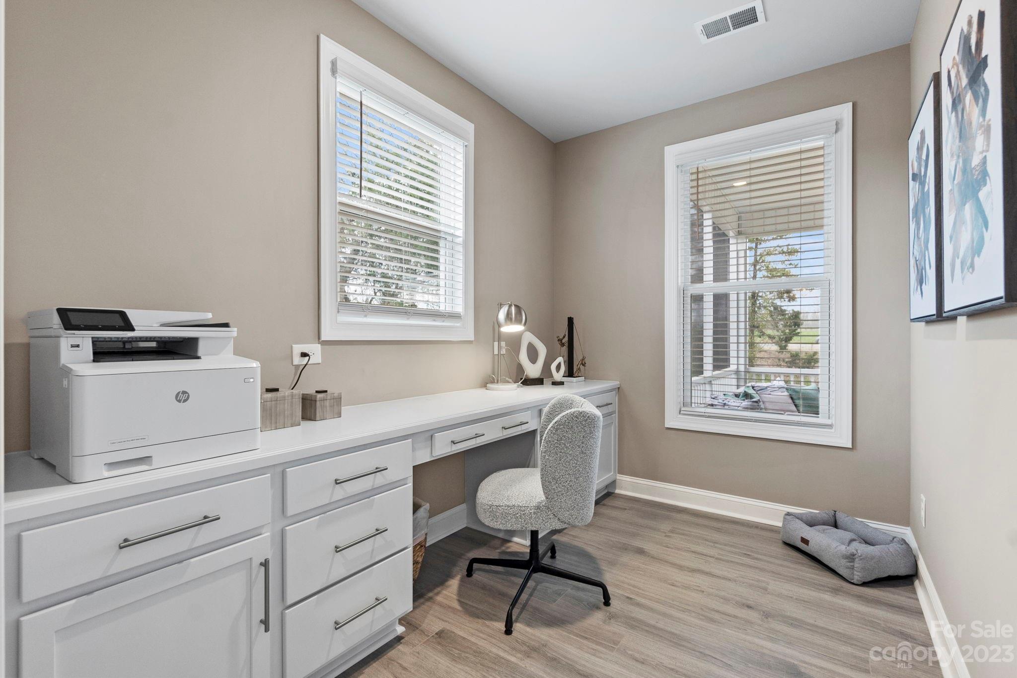 4505 Forsyth Place Fort Mill, SC 29708 - Photo 9 of 23 a view of a workspace with furniture and a window