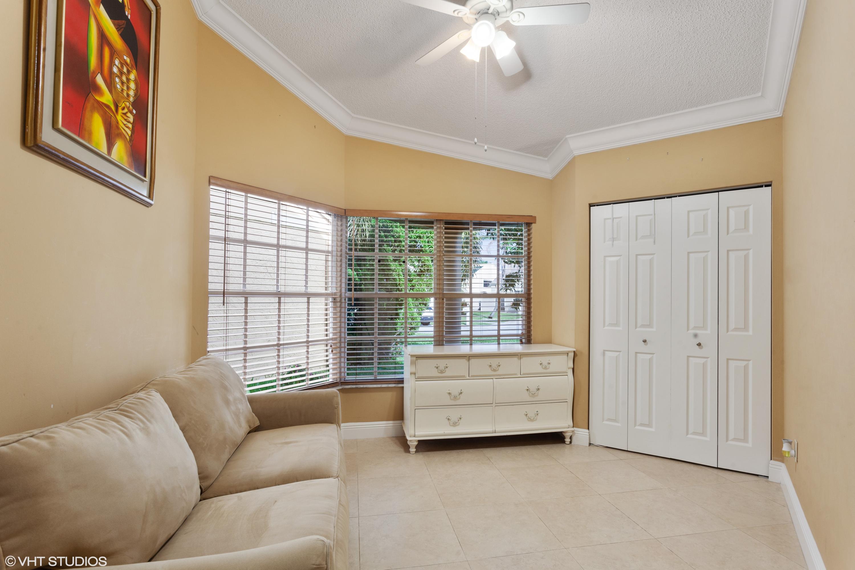 8563 Dynasty Drive Boca Raton, FL 33433 - Photo 8 of 15 09_8563DynastyDr_154_3rdBedroom_HiRes