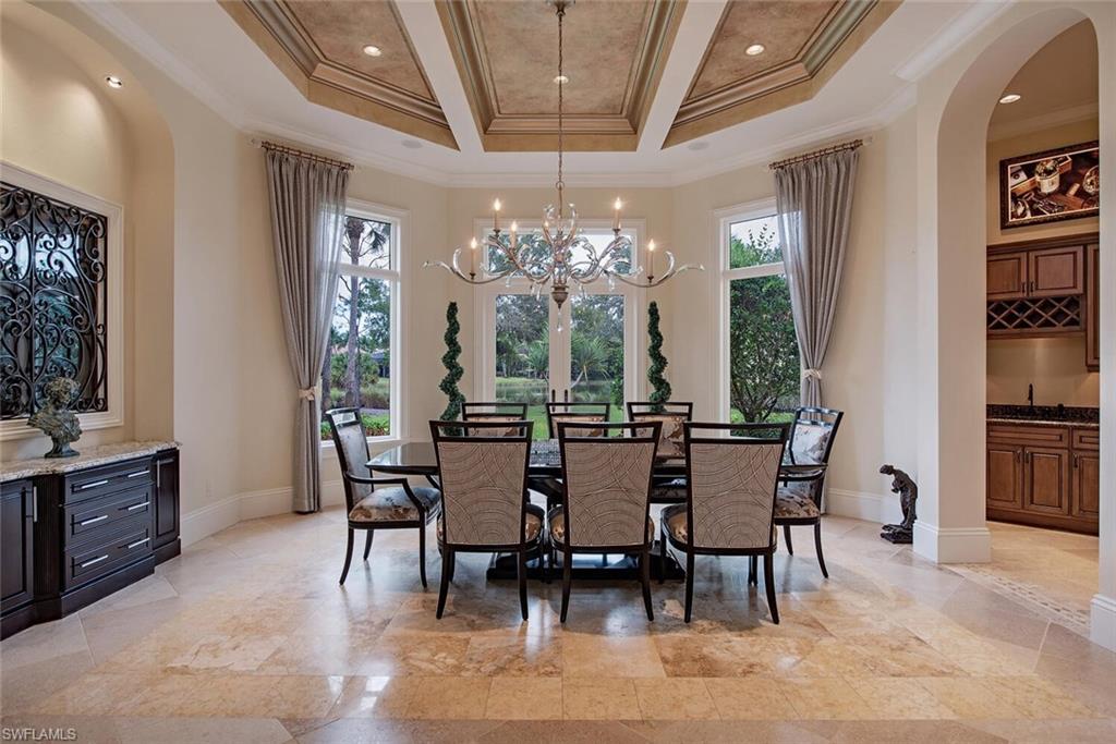 14919 Celle Way Naples, FL 34110 - Photo 6 of 42 a view of a dining room with furniture window and outside view