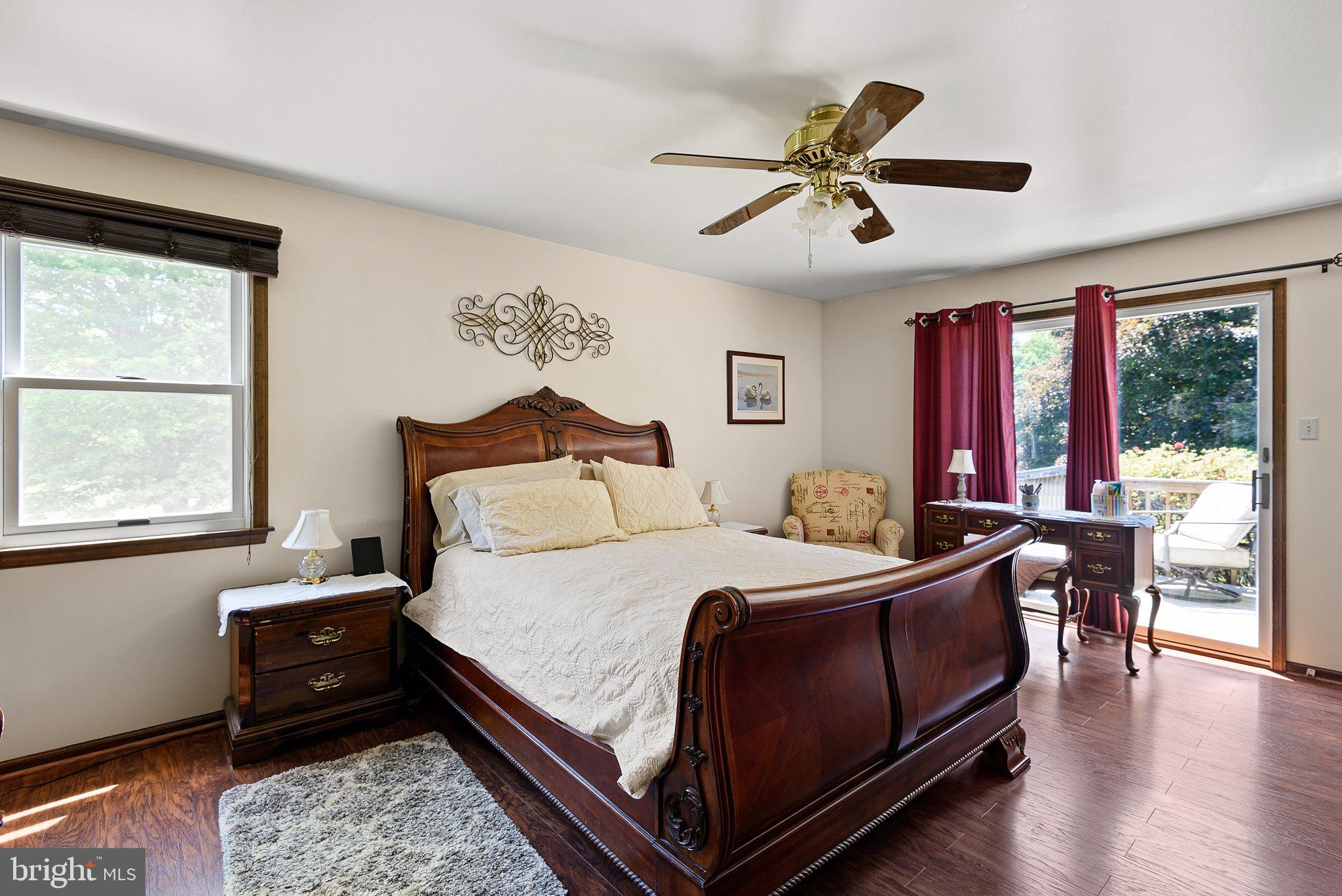 135 Blacksnake Road Elkton, MD 21921 - Photo 25 of 57 Main level primary bedroom with deck access