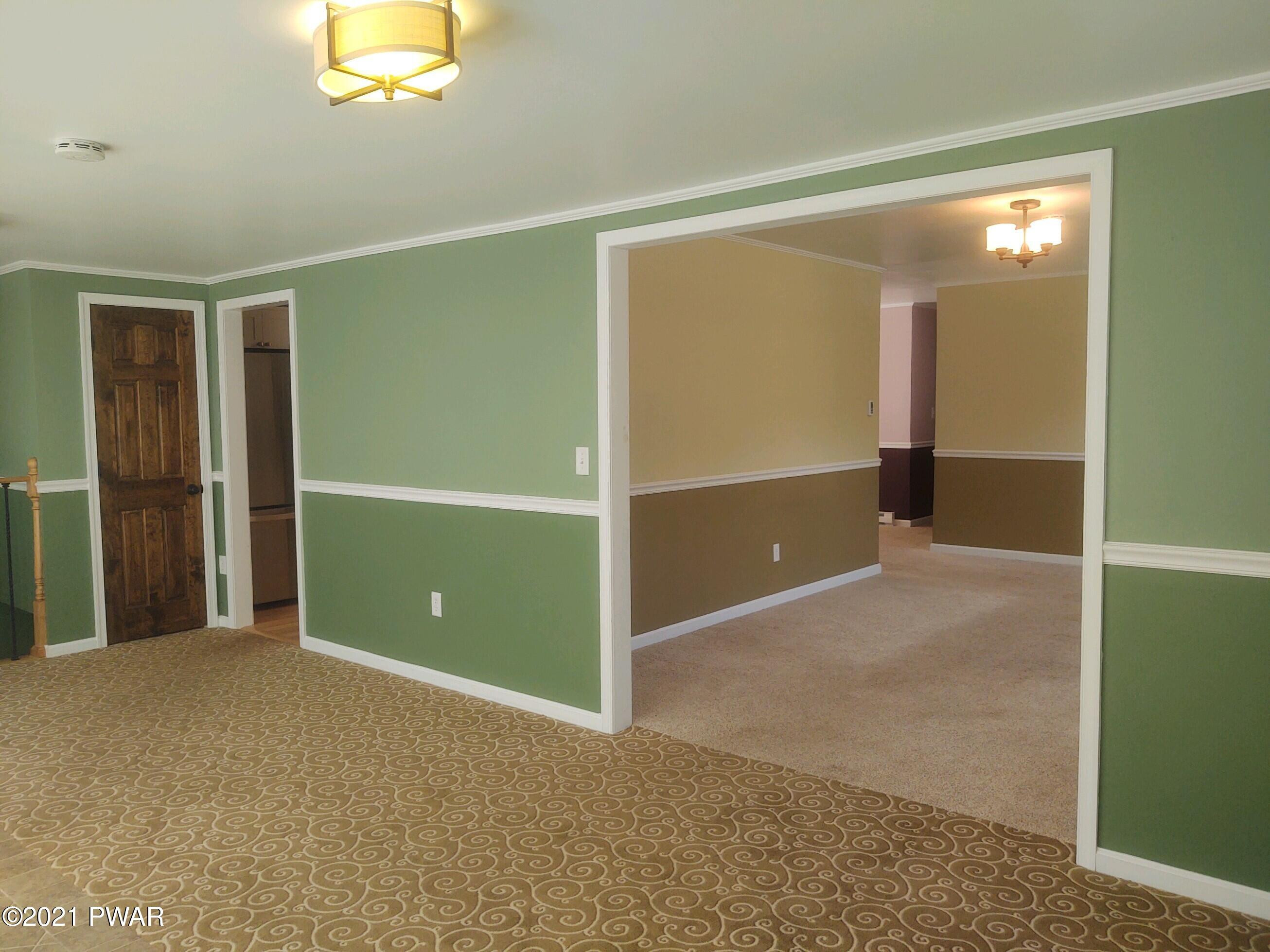 39 Starlight Lake Road Starlight, PA 18461 - Photo 19 of 36 family room towards living