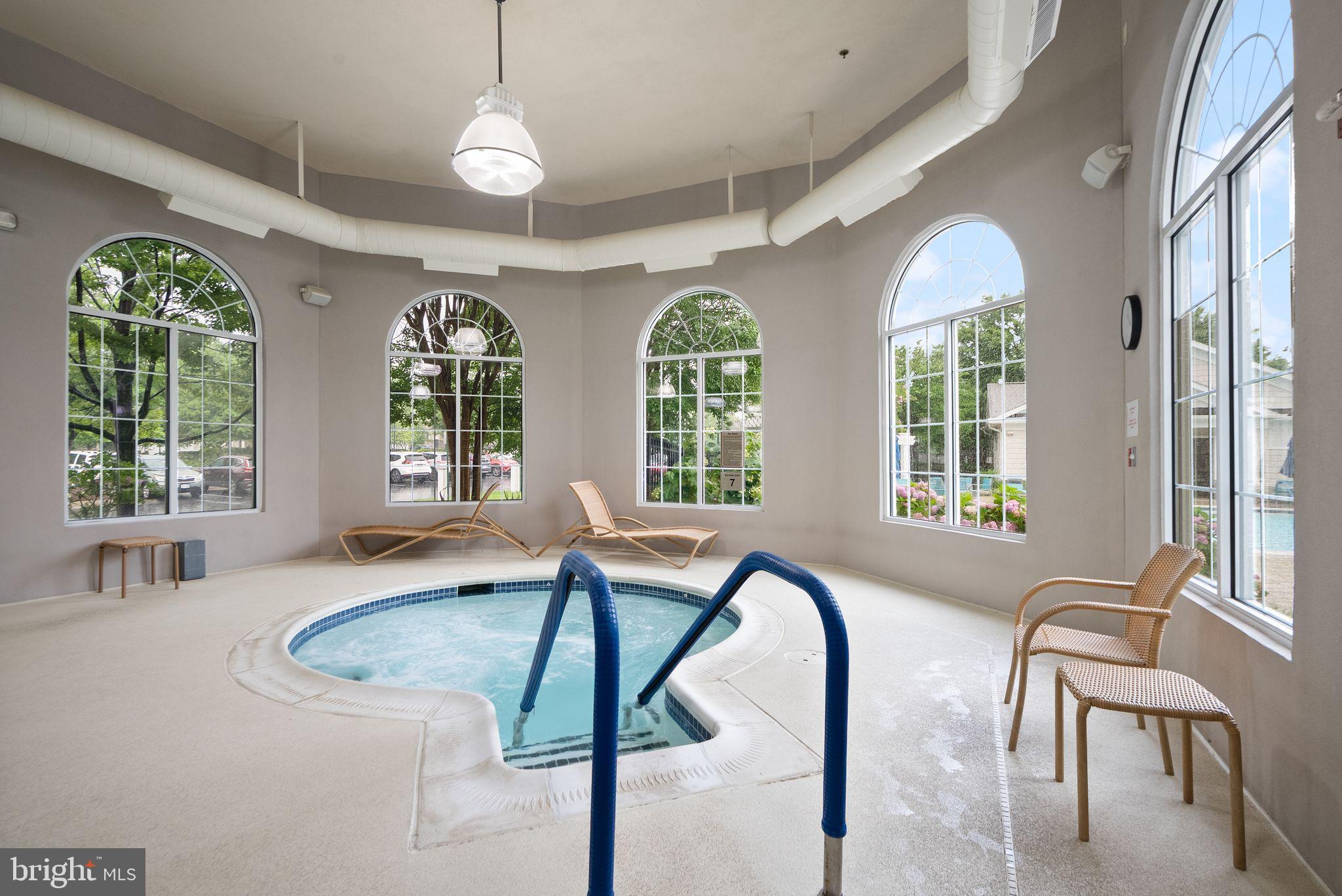 20610 Hope Spring Terrace, Unit 104 Ashburn, VA 20147 - Photo 32 of 38 Serene indoor spa retreat with views.