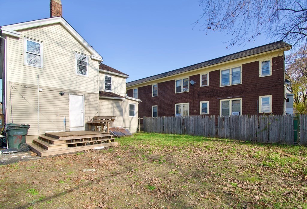 79 Quincy Street Springfield, MA 01109 - Photo 25 of 27 a view of a house with a yard