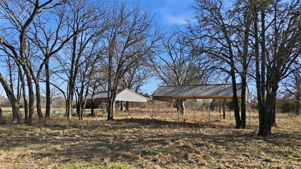 1619 County 156 Road Whitesboro, TX 76273 - Photo 11 of 17 a view of a house with a yard
