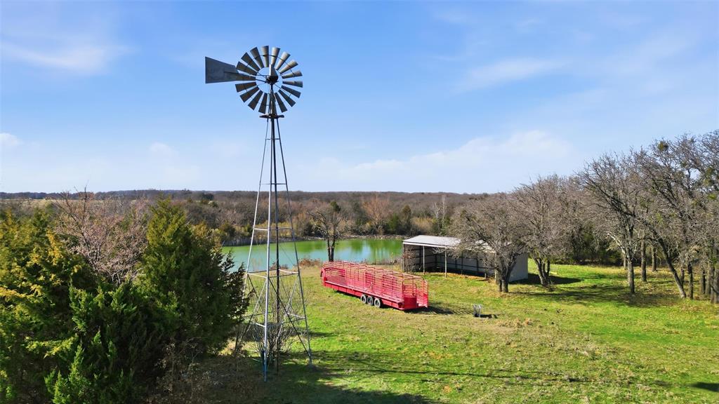 1619 County 156 Road Whitesboro, TX 76273 - Photo 2 of 17 a view of a backyard with swimming pool