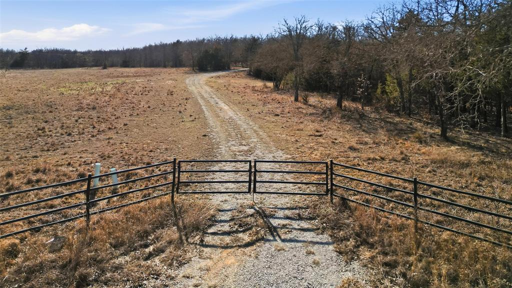 1619 County 156 Road Whitesboro, TX 76273 - Photo 6 of 17 a view of outdoor space and lake view