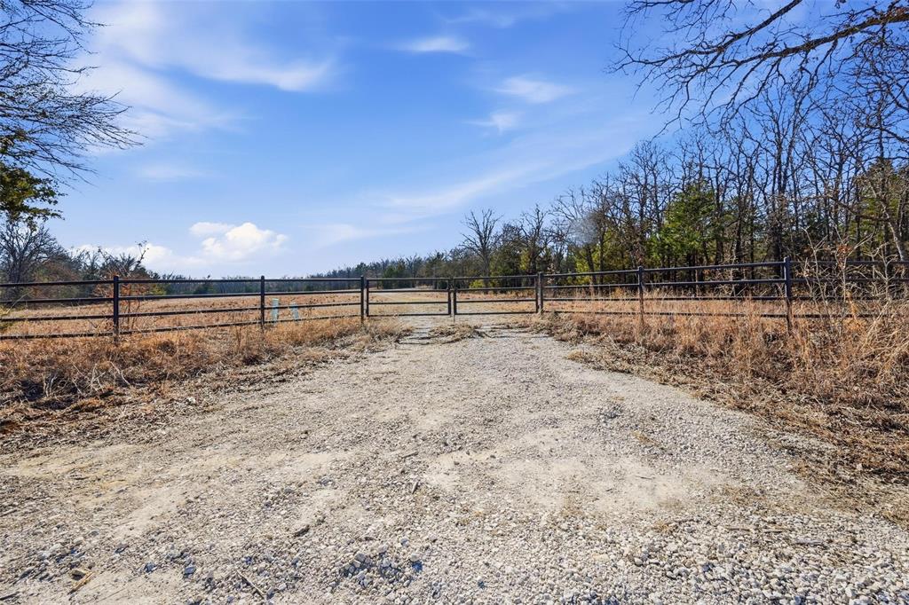 1619 County 156 Road Whitesboro, TX 76273 - Photo 7 of 17 a view of outdoor space with deck and yard
