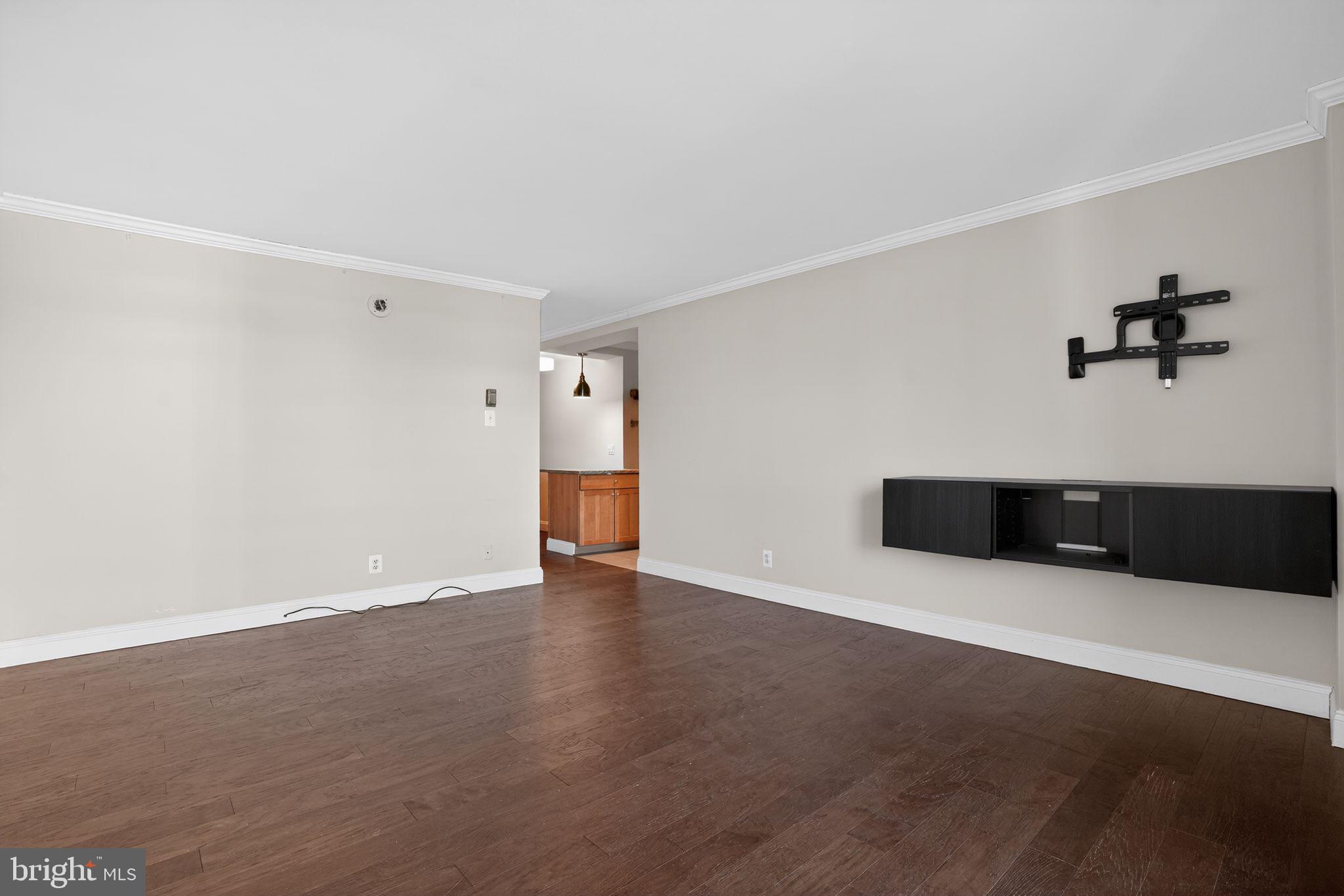 1435 4th Street Southwest, Unit B201 Washington, DC 20024 - Photo 3 of 13 a view of an empty room with a cabinet