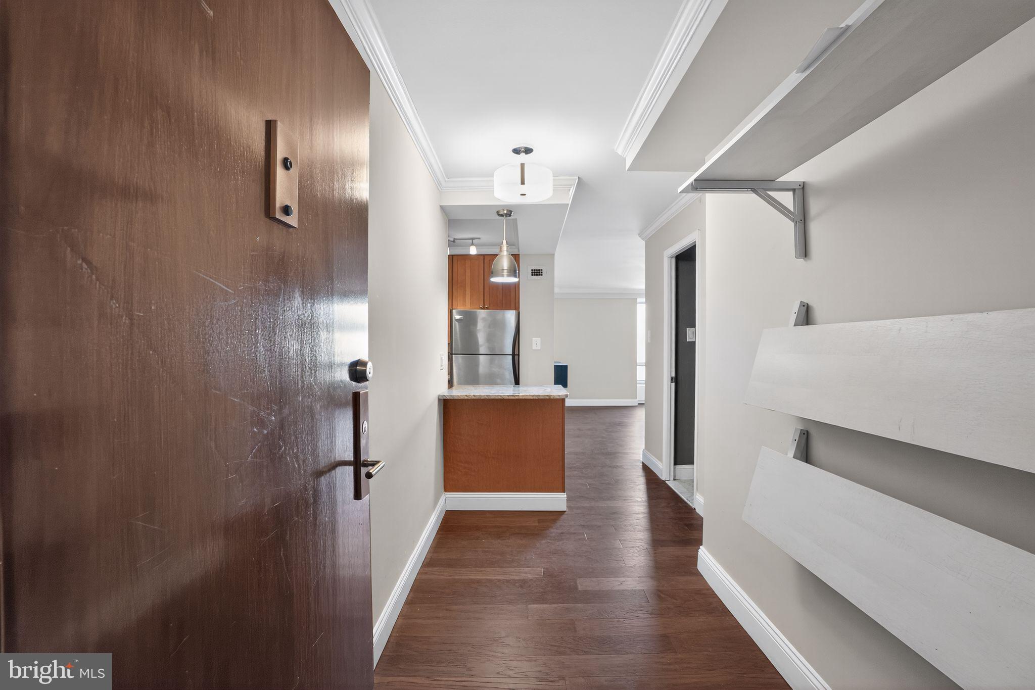 1435 4th Street Southwest, Unit B201 Washington, DC 20024 - Photo 4 of 13 a view of hallway with wooden floor