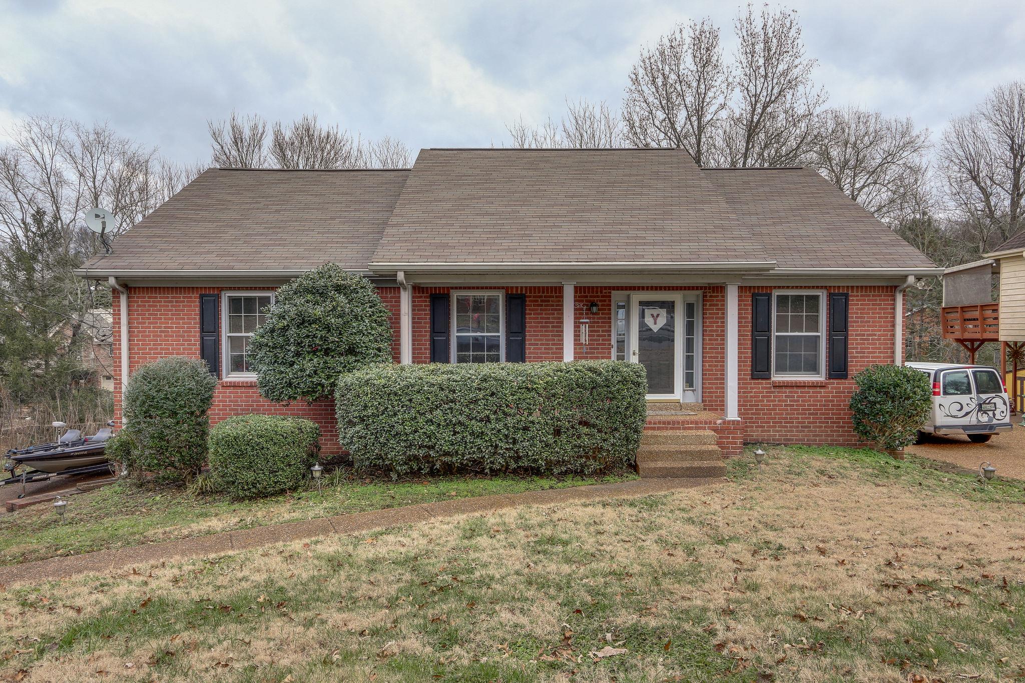 1056 Fitzpatrick Road Nashville, TN 37214 - Photo 1 of 28 All brick home with rocking chair front porch