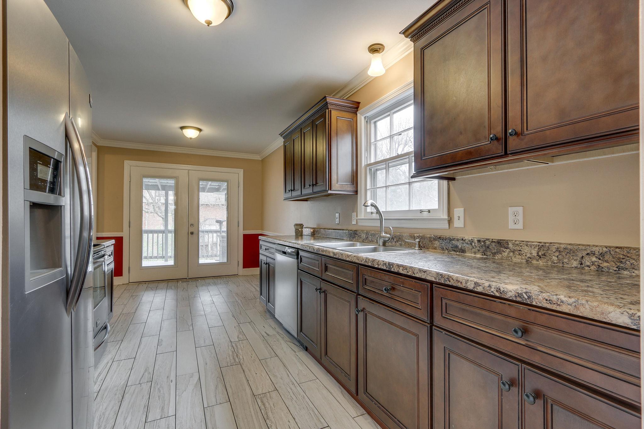 1056 Fitzpatrick Road Nashville, TN 37214 - Photo 13 of 28 View from formal dining room through kitchen and breakfast area