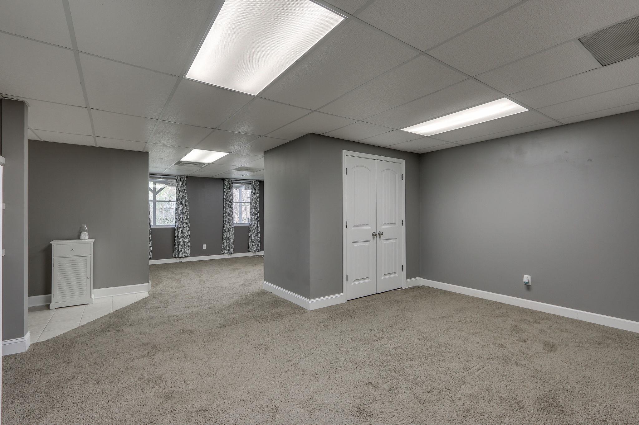 1056 Fitzpatrick Road Nashville, TN 37214 - Photo 20 of 28 Basement living space provides so many options – could be a lovely guest suite or whatever your family needs