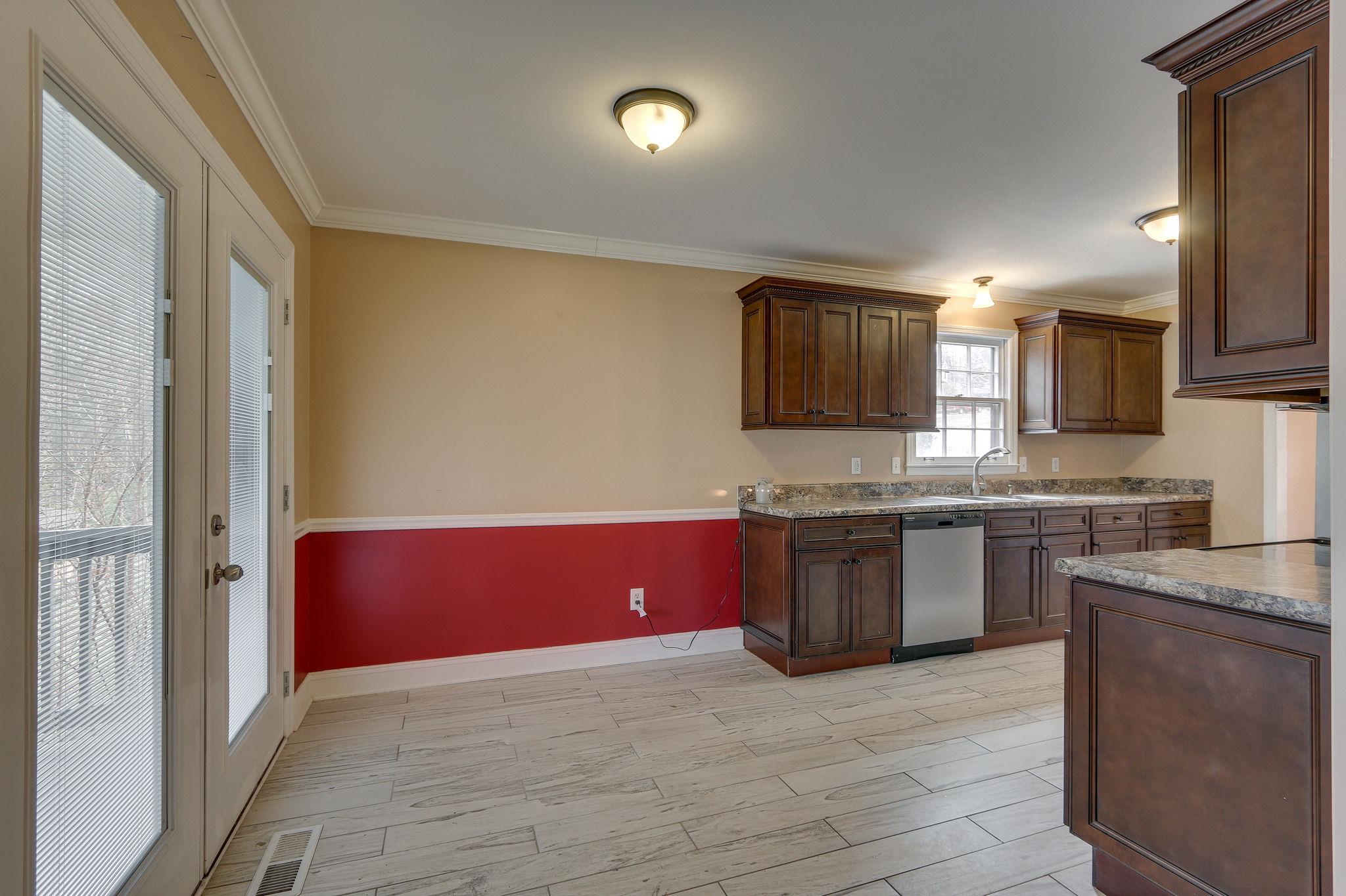1056 Fitzpatrick Road Nashville, TN 37214 - Photo 8 of 28 Living room to foyer and hall to bedrooms