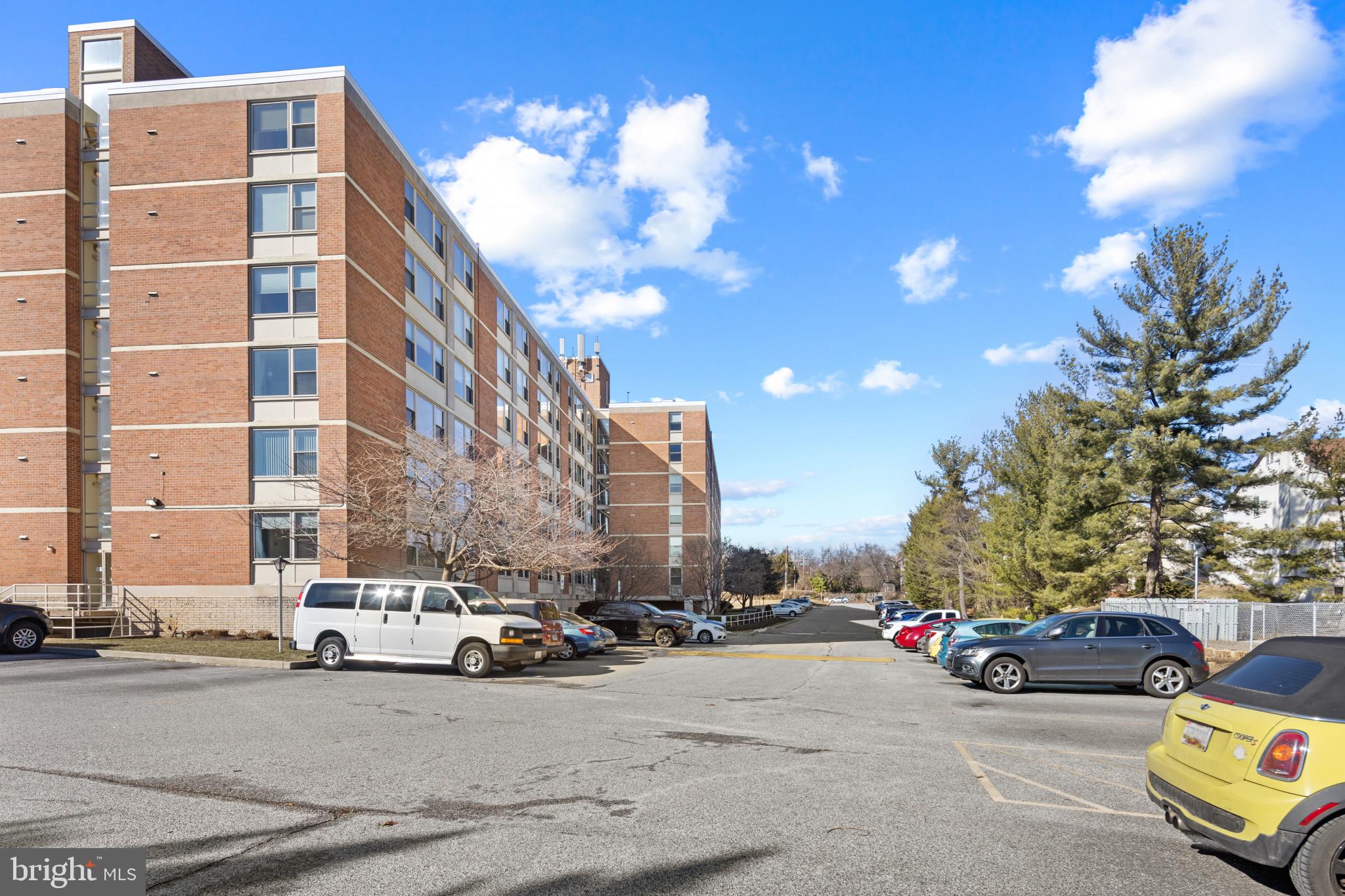 4401 Roland Avenue, Unit 310 Baltimore, MD 21210 - Photo 23 of 24 a view of street with cars