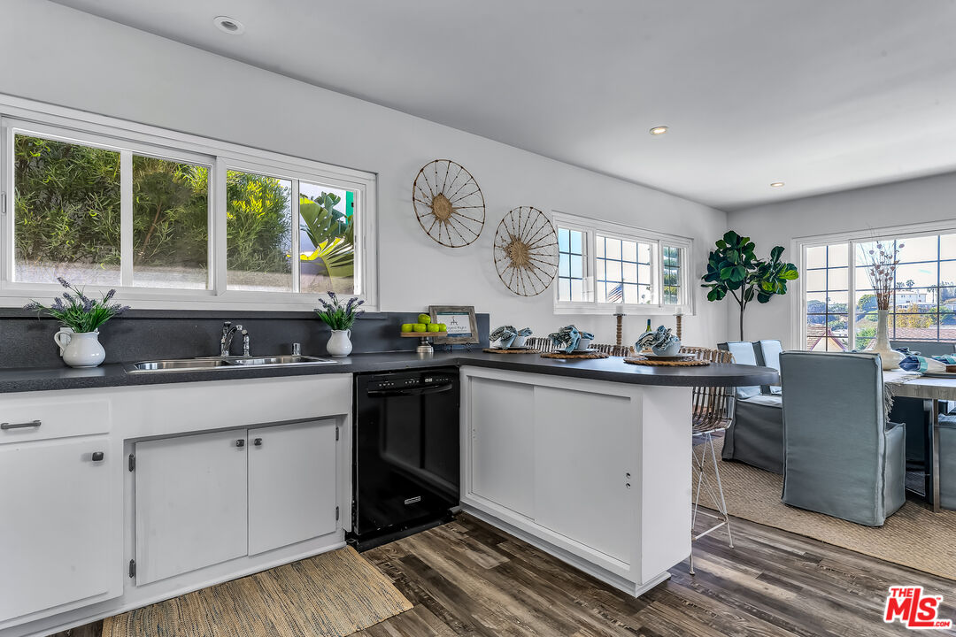 8330 Zitola Terrace Playa del Rey, CA 90293 - Photo 15 of 48 a kitchen with sink and cabinets