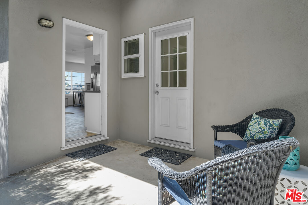 8330 Zitola Terrace Playa del Rey, CA 90293 - Photo 17 of 48 a bedroom with a bed and wooden floor