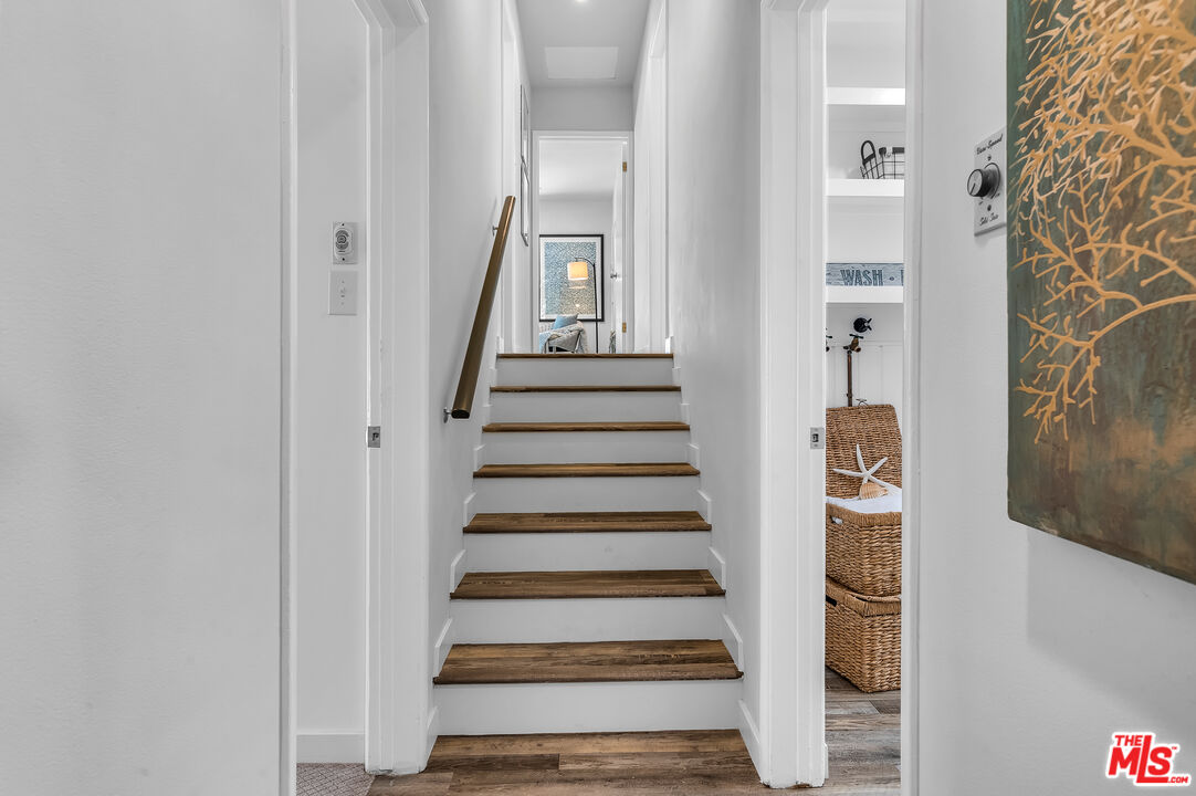 8330 Zitola Terrace Playa del Rey, CA 90293 - Photo 20 of 48 a view of staircase with white walls and windows